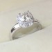 Round Cut White Sapphire Halo Engagement Ring